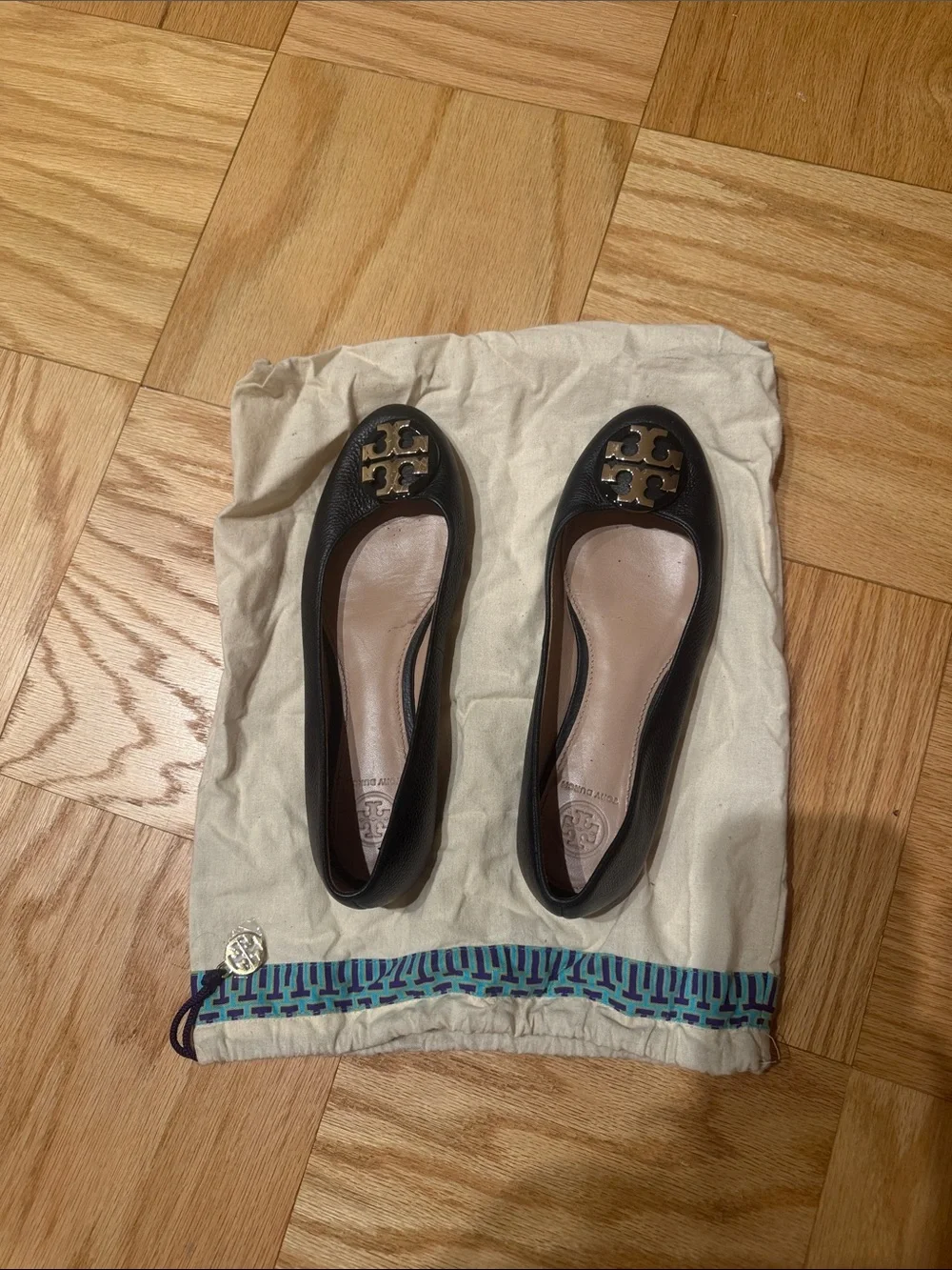 Tory Burch Black Leather Logo Ballet Flats with Gold Emblem
